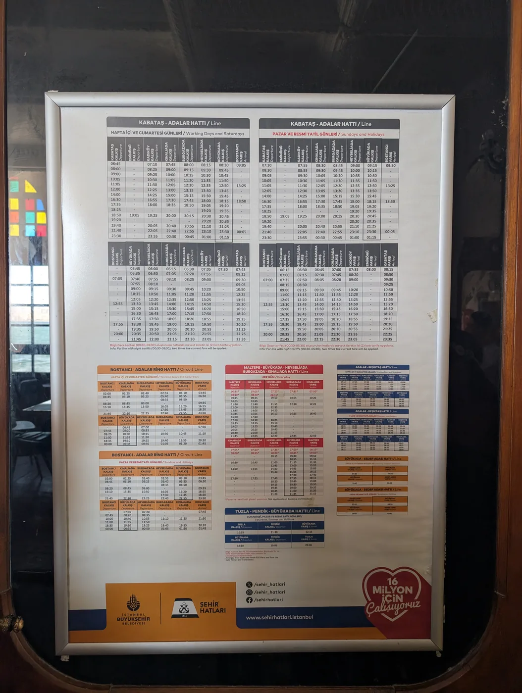 Ferry timetable display at Büyükada passenger ferry terminal