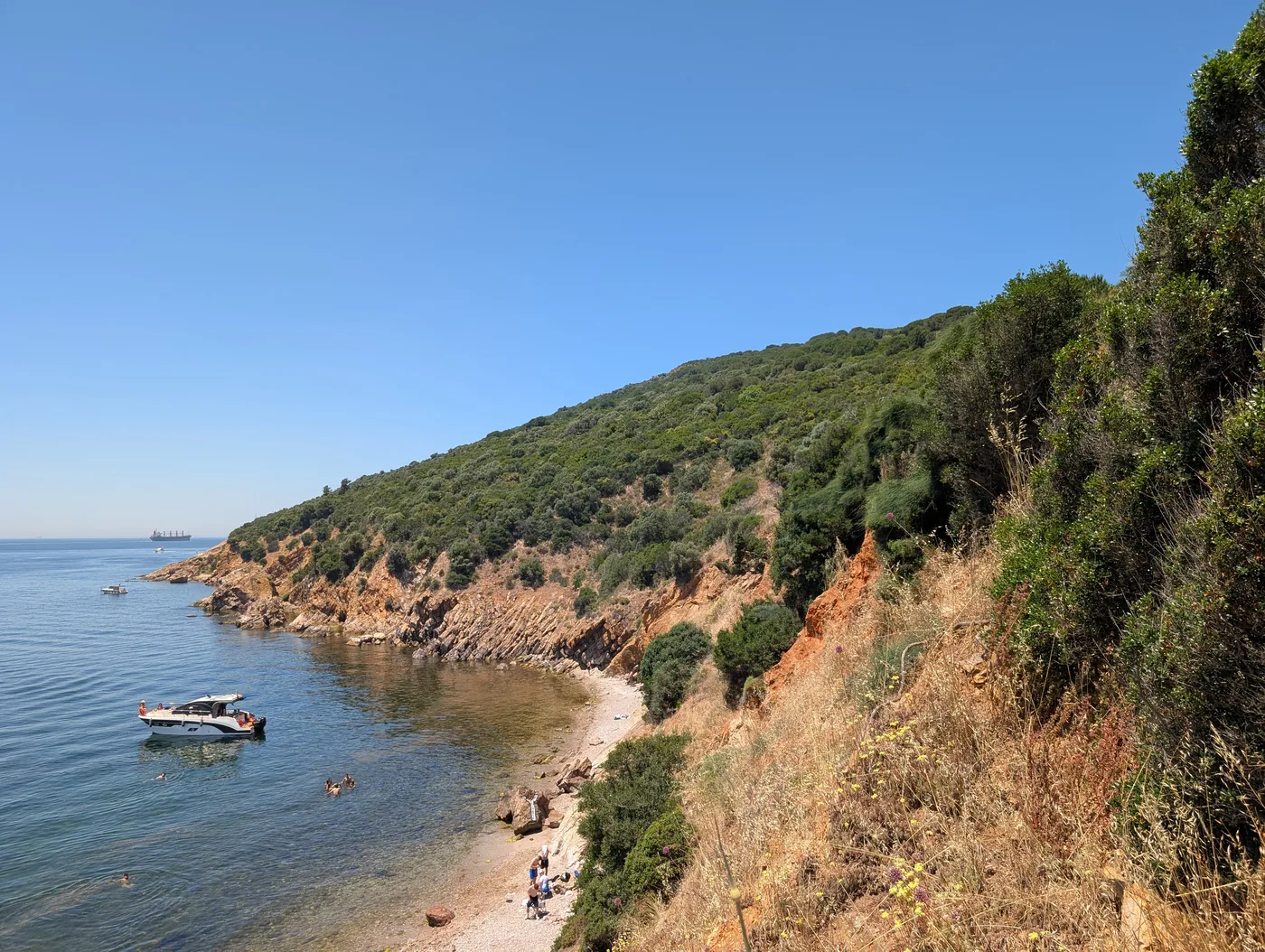 Secluded rocky swimming beach at Kurşunburnu Cape on Büyükada