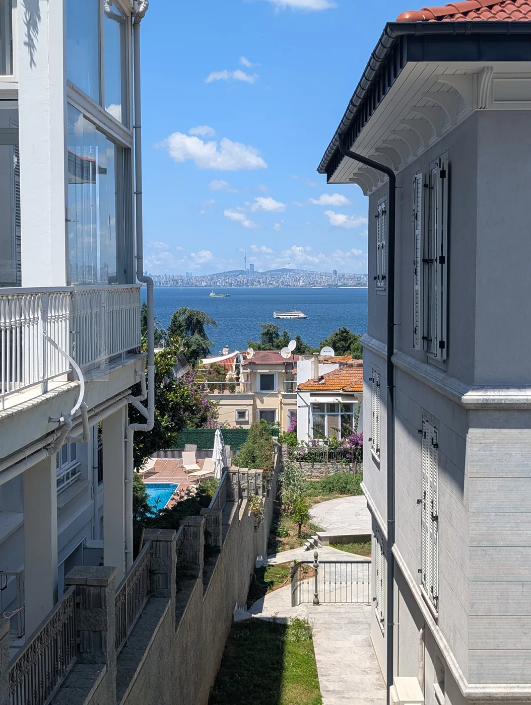 Sea of Marmara vista framed between historic wooden mansions on Büyükada